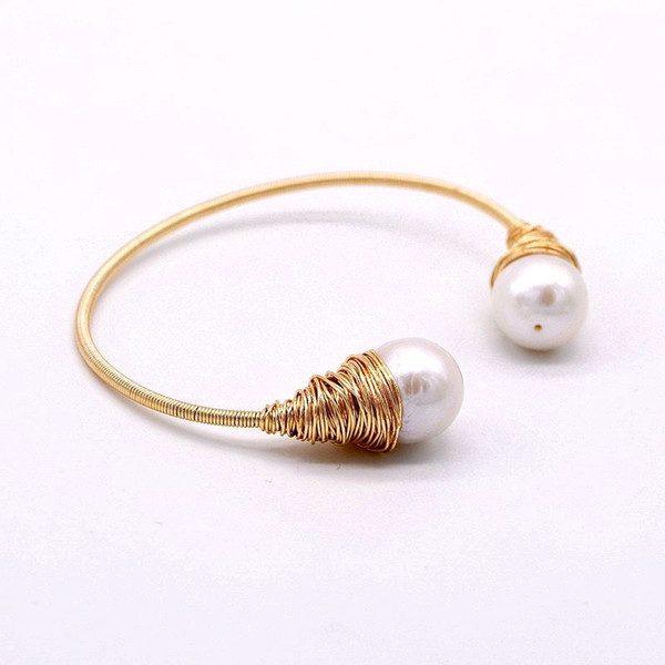 Design pearl bracelet. Natural white freshwater pearl. Designer works. Golden tinsel. Handmade. Women's Open Bracelet