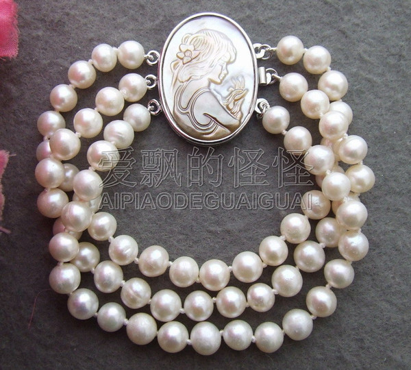 B110710 Stunning! 7MM White Pearl Bracelet