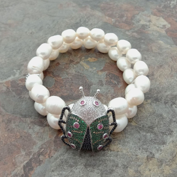 B041522 2 Rows White Rice Pearl Cz Pave Beetle Bracelet