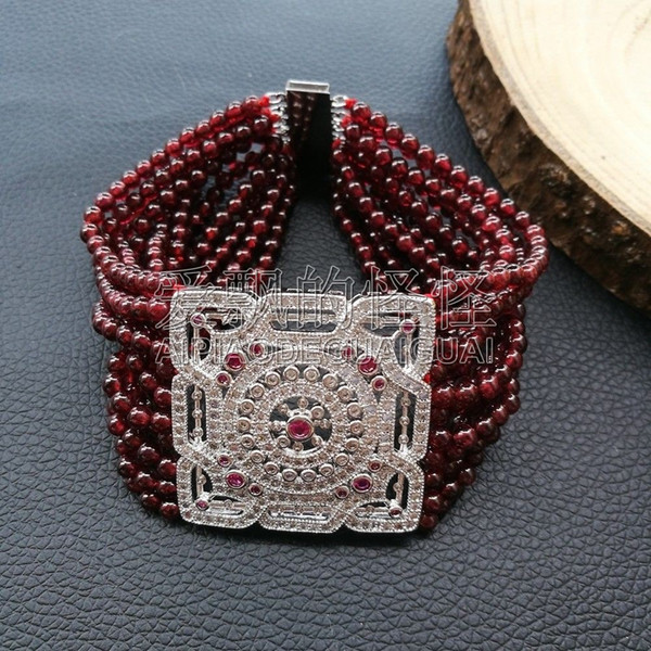 B091212 8'' 11 Strands Round Garnet Bracelet CZ Connector