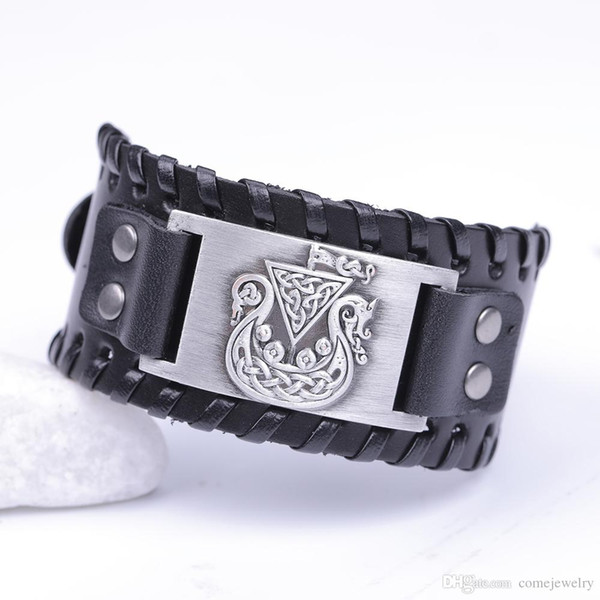 Fashion wicca Pirate shield concho in Antiqued silver on a black wide leather wristband Bangle jewelry