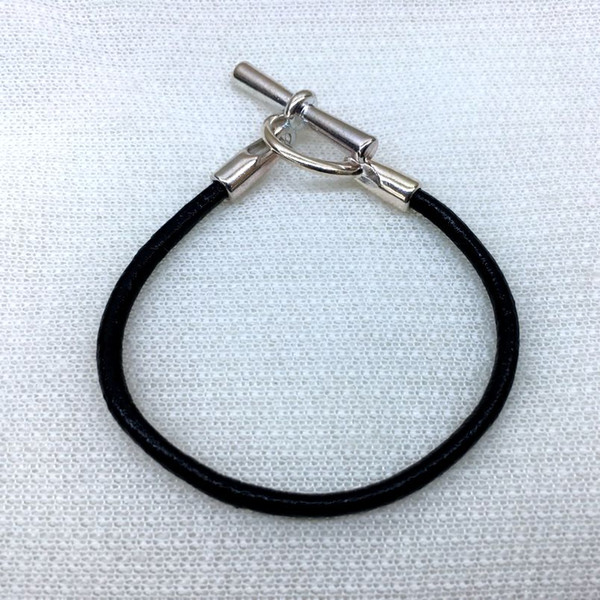 Cowhide bracelet. Handmade natural cowhide. black. Sterling silver alloy personalized buckle bracelet