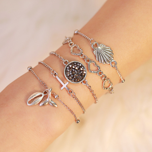 Best selling beach style fashion shell bracelet five-piece cross hollow hollow conch fishtail multi-element jewelry wholesale