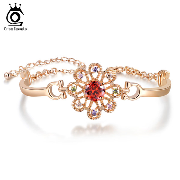 ORSA Latest Lucky Flower Design Luxury Heart and Arrow Cut Red Zircon Bracelet on Platinum Plated OMB10