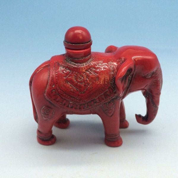 Delicate manual sculpture of coral rock to snuff bottle - an elephant