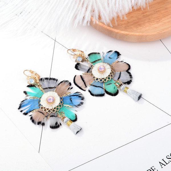 2018 new Personality design creative style handmade feather pendant stainless steel earrings European style Bohemian ethnic style earrings