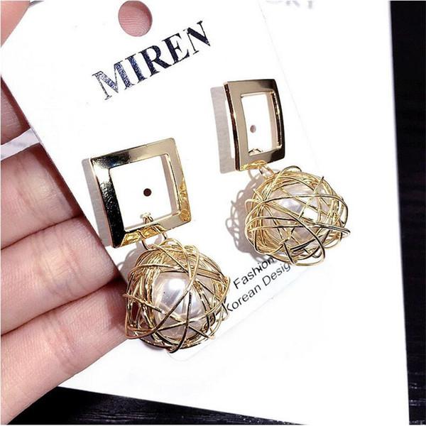S925 silver needle Korean temperament cold wind round hollow bird nest pearl earrings Wild jewelry simple earrings