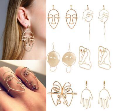 New European and American jewelry retro simple personality exaggerated earrings alloy plating hollow face earrings wholesale