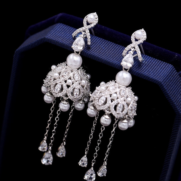 European and American fashion jewelry S925 silver needle wind chime micro inlaid zircon earrings earrings fringed pearl bride dinner