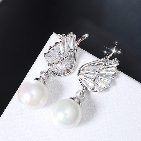 Pearl ear jewelry new personality S925 silver needle ear nails female angel wings earrings fashion long paragraph beautiful atmosphere