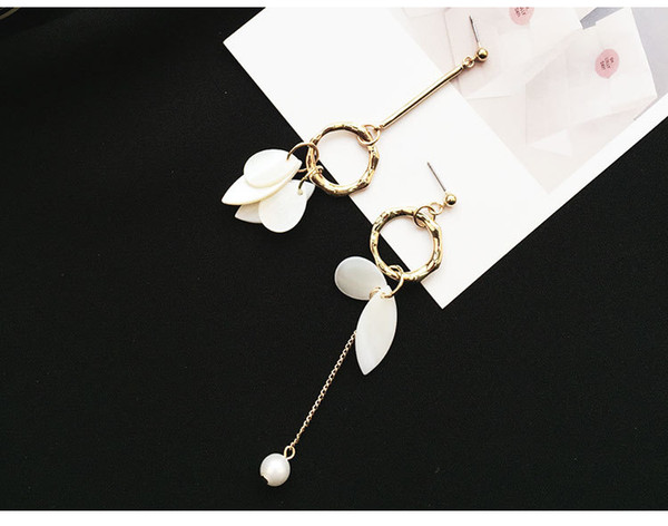 Wo Qiao Korean version asymmetric shell pearl earrings Camellia flower ear nails earrings clip no earhole Circle Earrings wholesale women