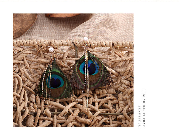 Explosive new accessories Korean version fashion retro national wind peacock feather fringed Earrings Romantic beach female Earrings