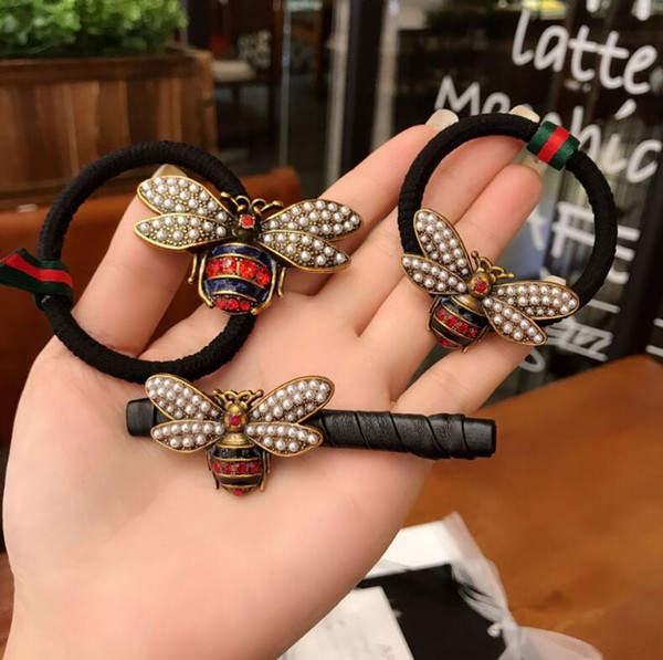 Korean version of the new headdress Europe and the United States retro alloy drop oil bee imitation pearl hair rope rubber band clip hairpin