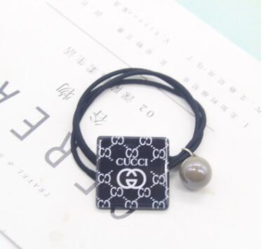 Japan and South Korea popular black enamel cat horsetail hair circle hair band factory direct