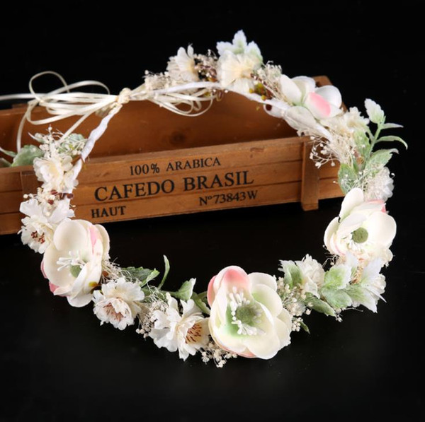 White flowers, garlands, bridal gowns, coloured dried flowers, headwear, bridal ornaments.