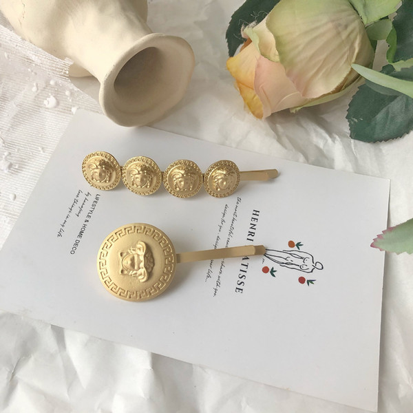 Do old cold breeze beauty head small coin dumb gold hair pin ins same style web celebrity hair ornament word edge clip female