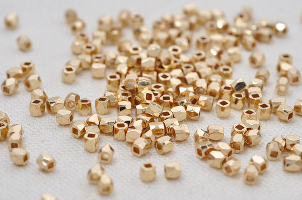 Light gold copper spacer beads polygon surface is about 3mm x 3mm hole: about 1.5 mm, 1000PCS