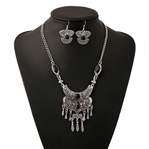 Hot sale metal texture carved tassel necklace pendant women jewelry Euramerican fashion trend of retro ethnic earing necklace set