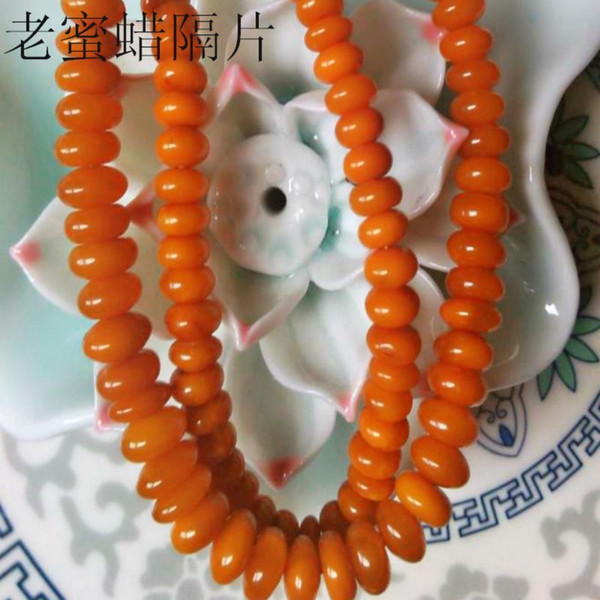 [produced] bell into pure natural beeswax beads imported old abacus beads bracelet DIY materials wholesale