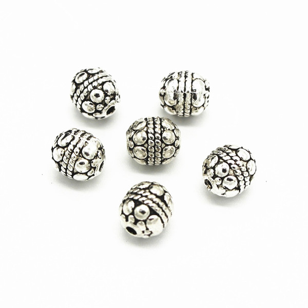 100 PCS 7mm*8mm Vintage Metal Alloy Spacer Beads Nepal Carved Hole Beads For Jewelry Making