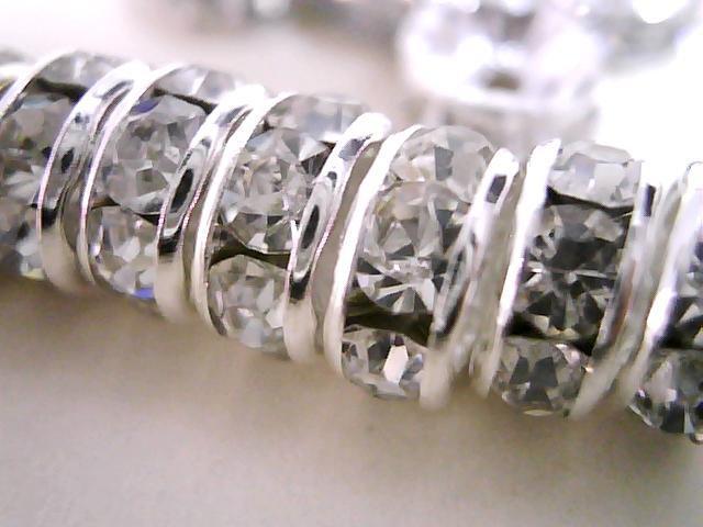 A grade 10mm silver tone rhinestone spacer / loose beads