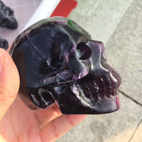 Natural purple fluorite carved skull ornament