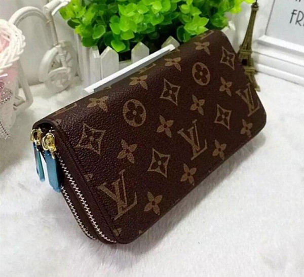 Europe and the United States trend fashion clutch wallet female double zipper
LV
 simple letter embossed striped large capacity wall