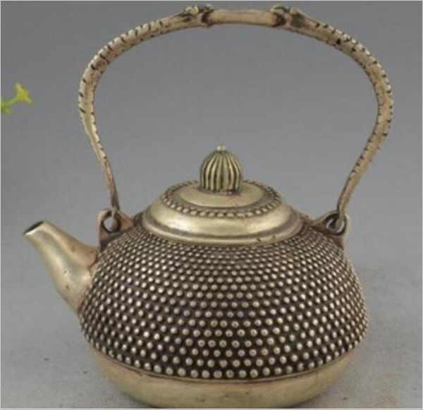Wholesale - Chinese Tibet Silver carved Beautiful Leisurely Teapot Statue