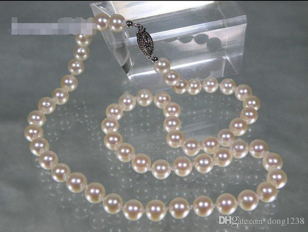 GORGEOUS AKOYA WHITE 7.5-8mm AAA+ ROUND PEARL 18