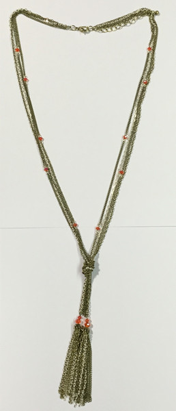 burnished gold mult chains tassel necklace with peach faceted glass beads