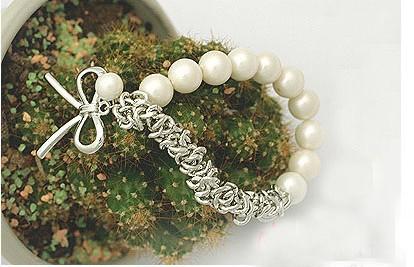 Hot Selling New Fashions beautiful pearl bow new bracelet pearl bracelet bow bracelet free shipping with tracking number