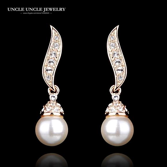 Elegant Rose Gold Color Round White Simulated Pearl Rhinestones Studded Wave Design Woman Earring Wholesale