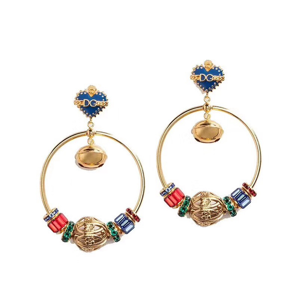 early spring new earrings letter female national wind ear clips bell ear clip earrings counter uniform brass material