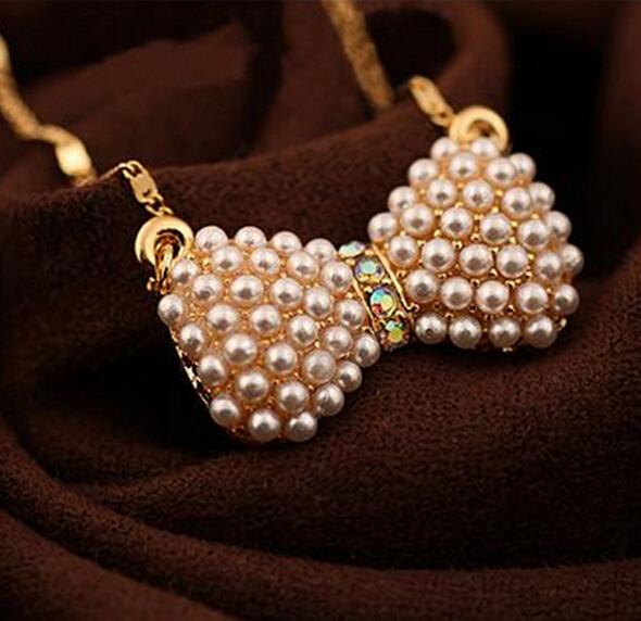 Explosive jewelry fashion small fresh bow pearl necklace sweet bow pearl crystal pendant wholesale free shipping