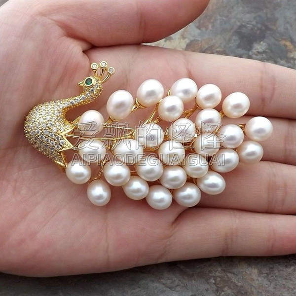 BR111711 White Pearl Cz Pave Peacock Brooch