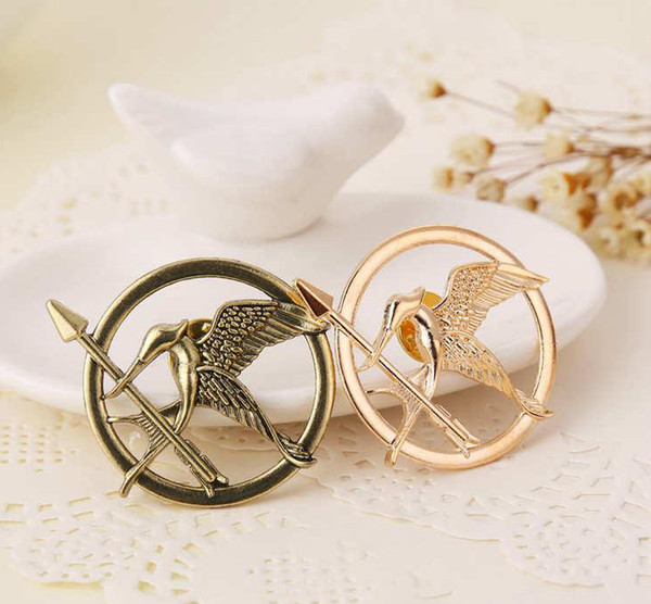 The Hunger Games Brooches Inspired Mockingjay And Arrow Brooches Pin Corsage Gold Bronze Silver free shipping