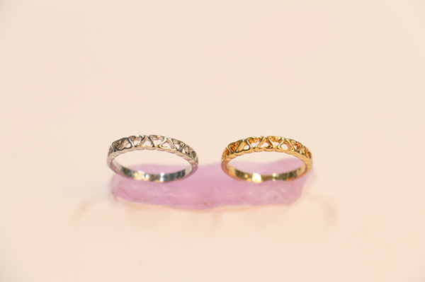 Fashion hollow out hearts are linked together ring,cute ring designed for women, wholesale free shipping