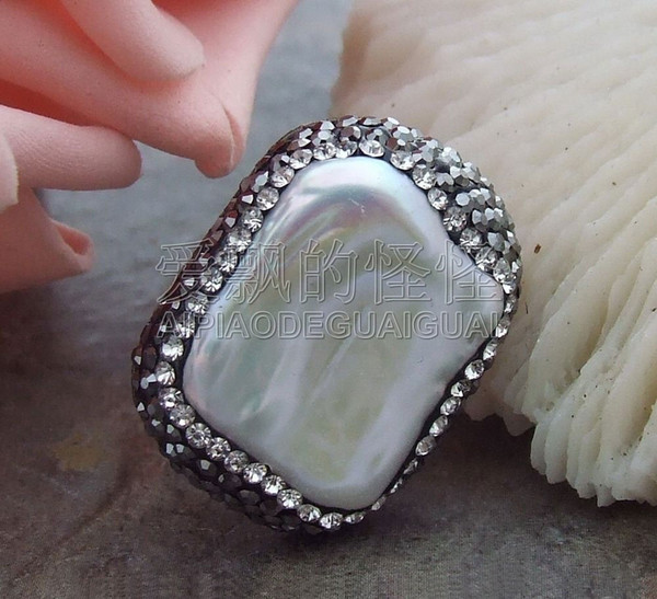 R071012 16x20mm White Keshi Pearl Trimmed With Marcasite Ring