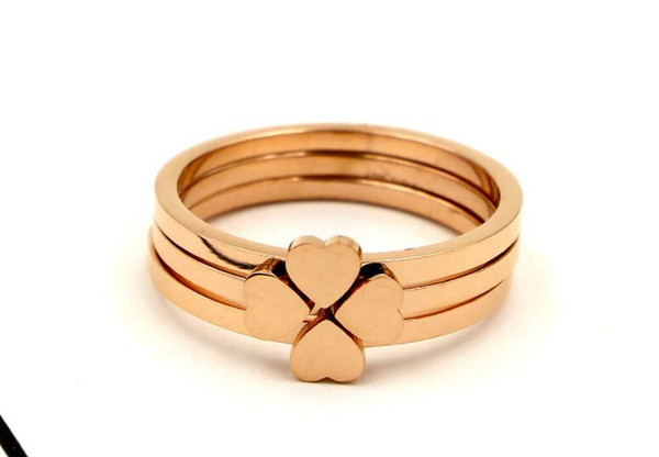 Korean three-in-one combination clover titanium steel rose gold ring female fashion heart three-piece index ring