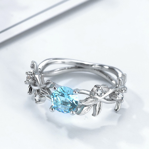 NEW ARRIVAL HOT SALE Europe and America hand ornaments aquamarine tree rings lucky flowers CNW089