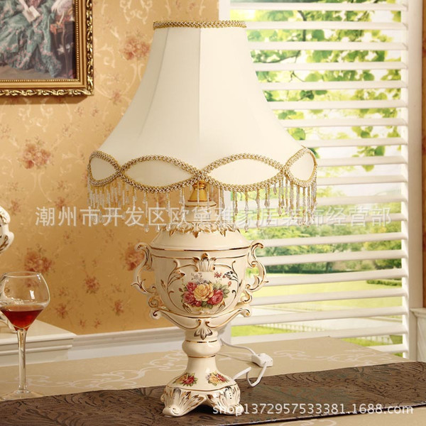 European luxury ivory porcelain gilt lamp bedroom lamp creative wedding gifts lighting factory outlets