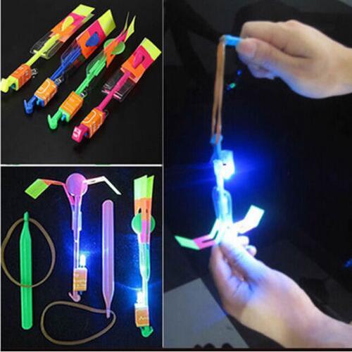 200pcs Luminous Big Slingshot Catapult Arrows Flying Fairies Flash Helicopter Flying LED Light Emitting Children's Toys