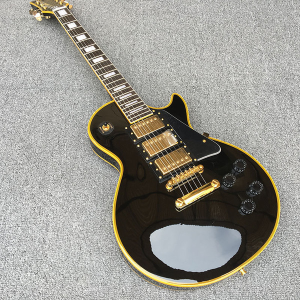 3 Pickups Custom Shop Electric guitar,Solid Mahogany body With Black paint and yellow binding,Golden Hardware,free shipping!