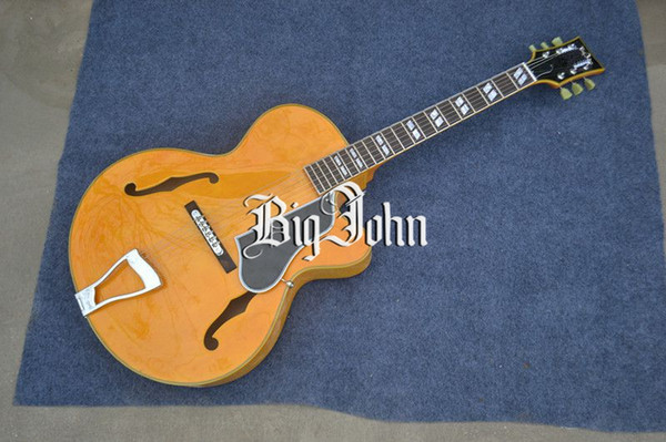 free shipping new arrived hollow F hole acoustic guitar in yellow with mahogany body made in China F-3056