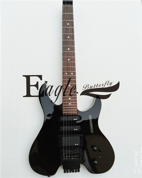 Eagle. Butterfly, electric guitar, electric bass, custom instrument shop .Headless Electric Guitar Steinberg black Guitar custom