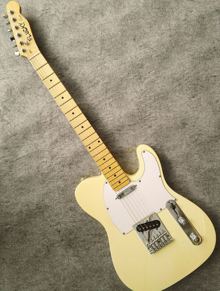 Free shipping, factory direct sales to accept customization, deal with surprise.Light yellow TL electric guitar