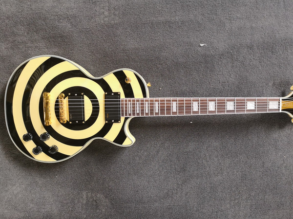 The black and yellow six-string guitar is gorgeous