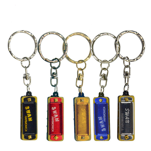 Wholesale-The new SWAN Swan four hole octave harmonica harmonica Keychain small children gift 5 color options