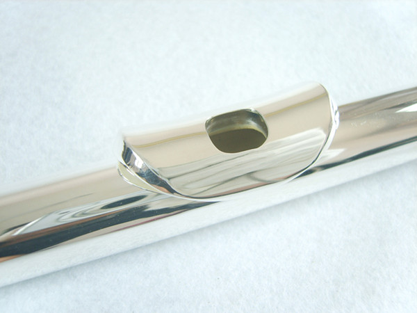 C-adjustable 16-hole closed-cell curved type with E-key split nickel-plated flute instrument