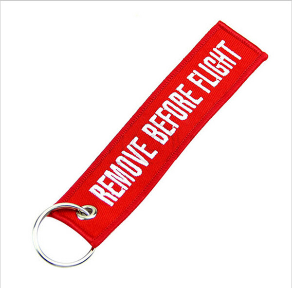 Wholesale-OP-[One World] Remove Before Flight Key Chain Luggage Tag Zipper Pull Woven Embroidery Keychain Save up to 50%